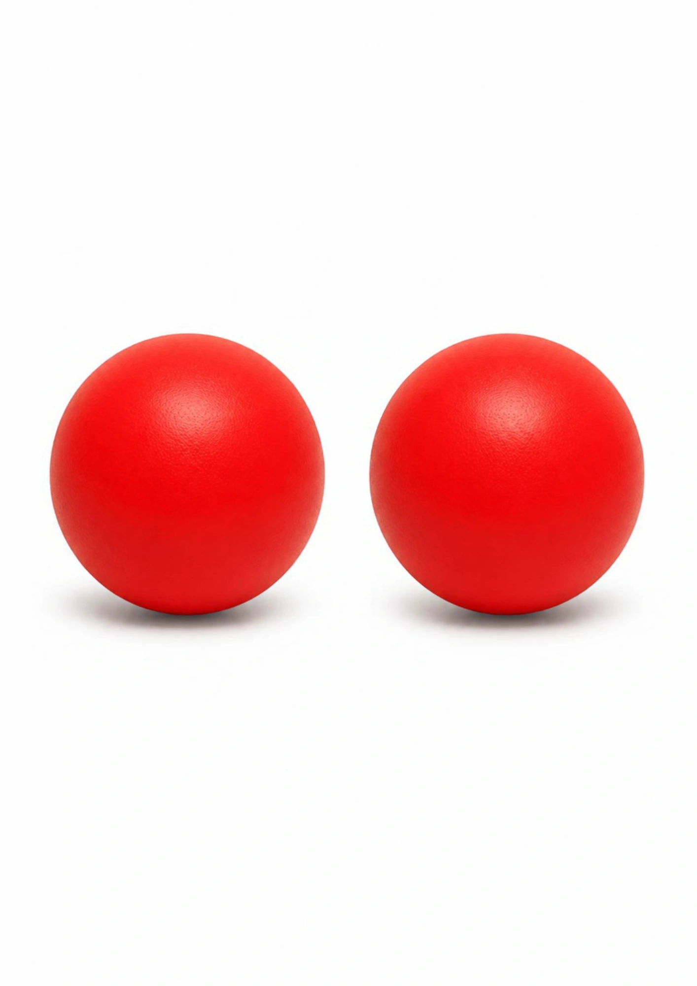 Two matching red balls for a toddler same-and-match activity